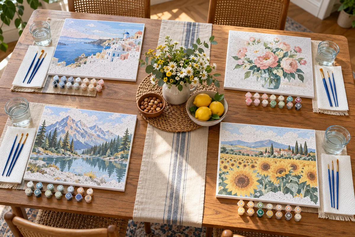 Four separate paint by numbers workstations set for an adult painting party