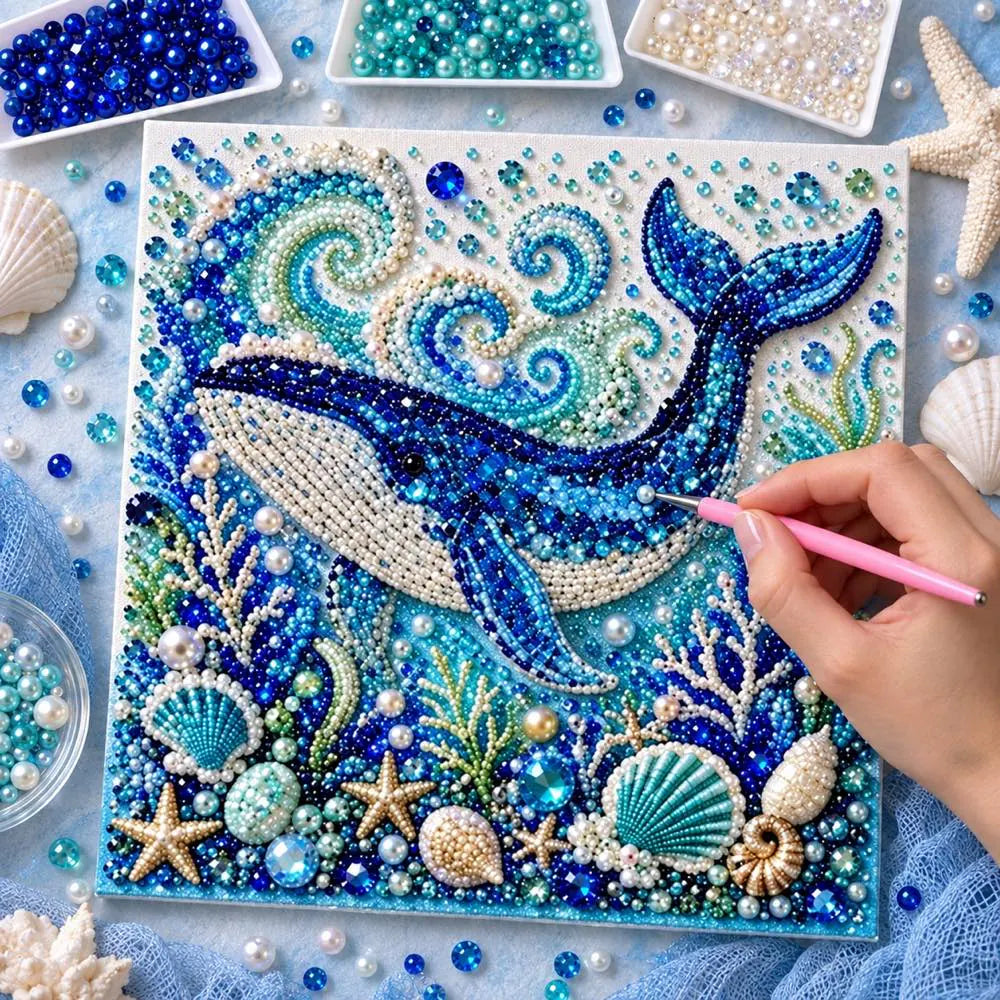 Pearl placement process on the blue whale printed canvas