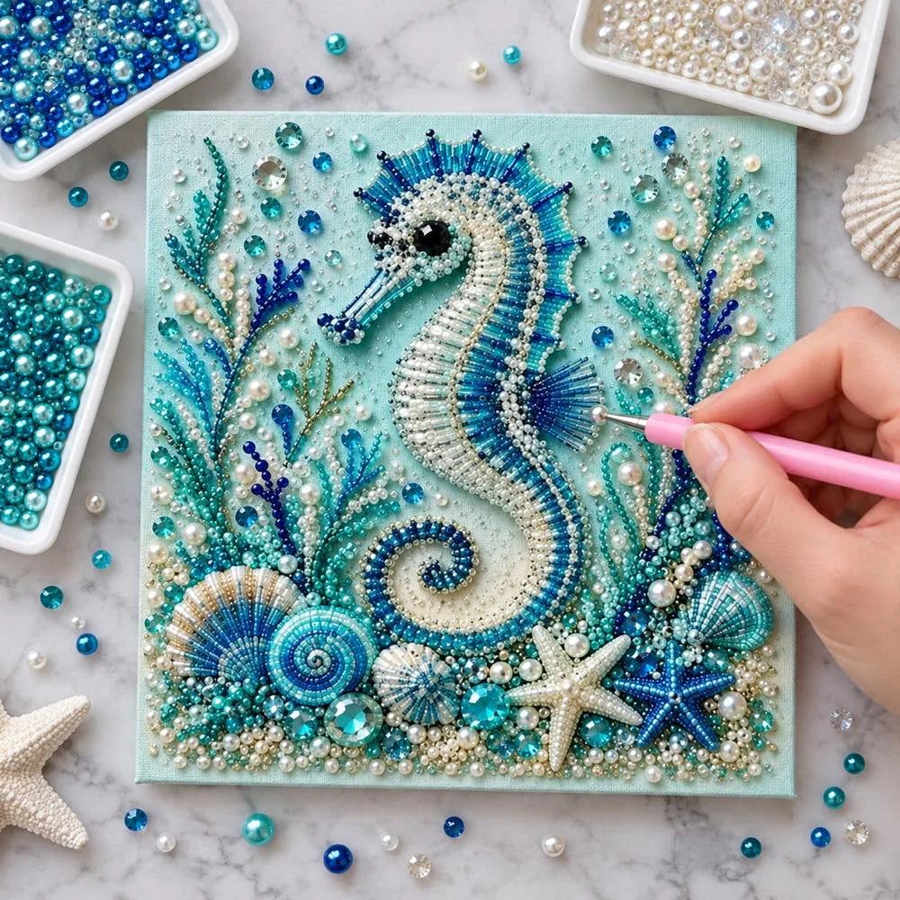 Pearl placement process on the seahorse printed canvas