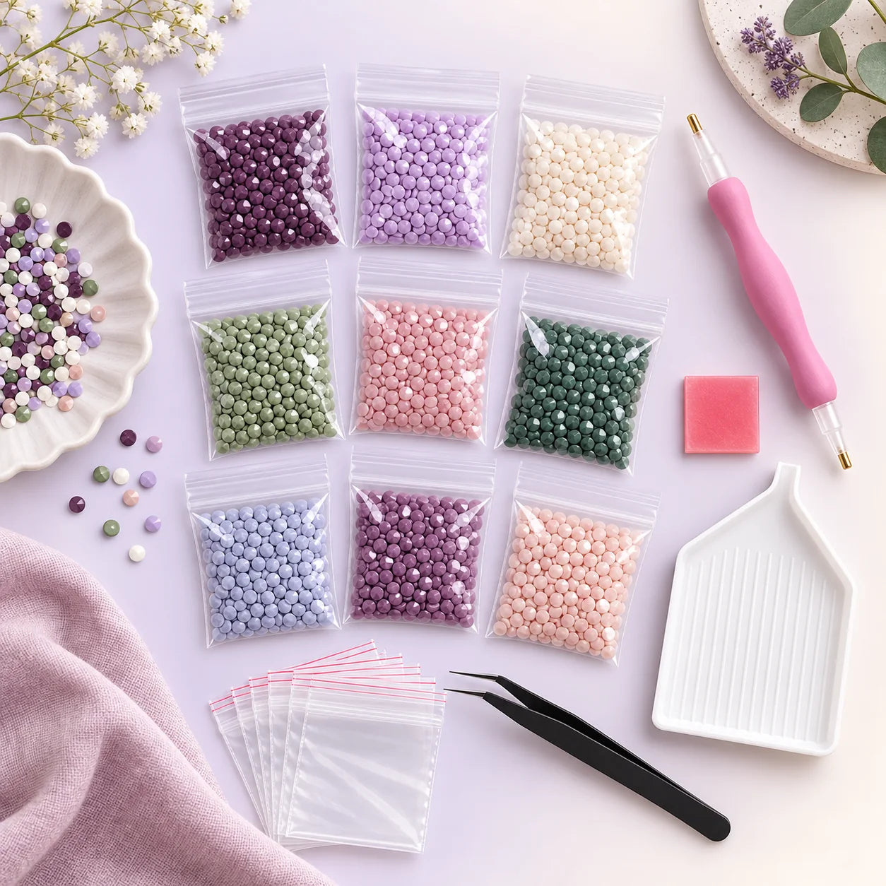Organized extra resin diamonds with pink applicator pen and tray