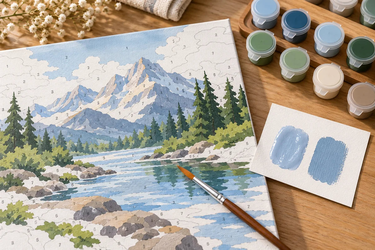 Original illustration of a paint by numbers mountain canvas with open acrylic paint pots and wet and dry color swatches.