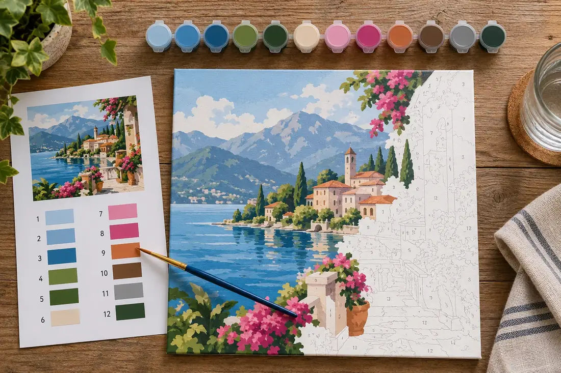 Numbered paint by numbers landscape canvas beside its color key and matching paint pots