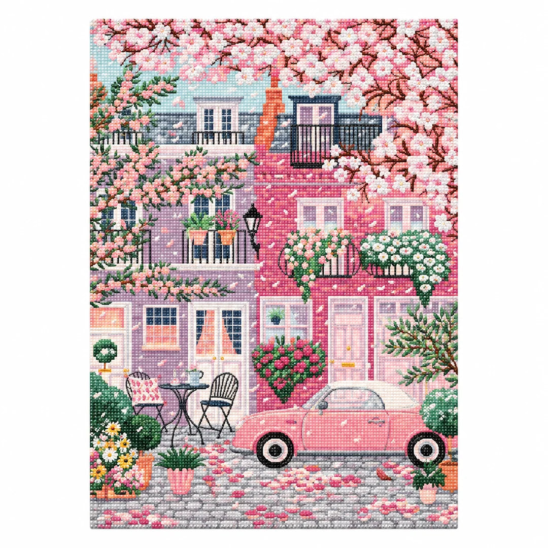Completed cherry blossom street artwork on white, diamond painting kit