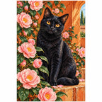 Black cat among pink camellias: finished diamond painting on a clean white background