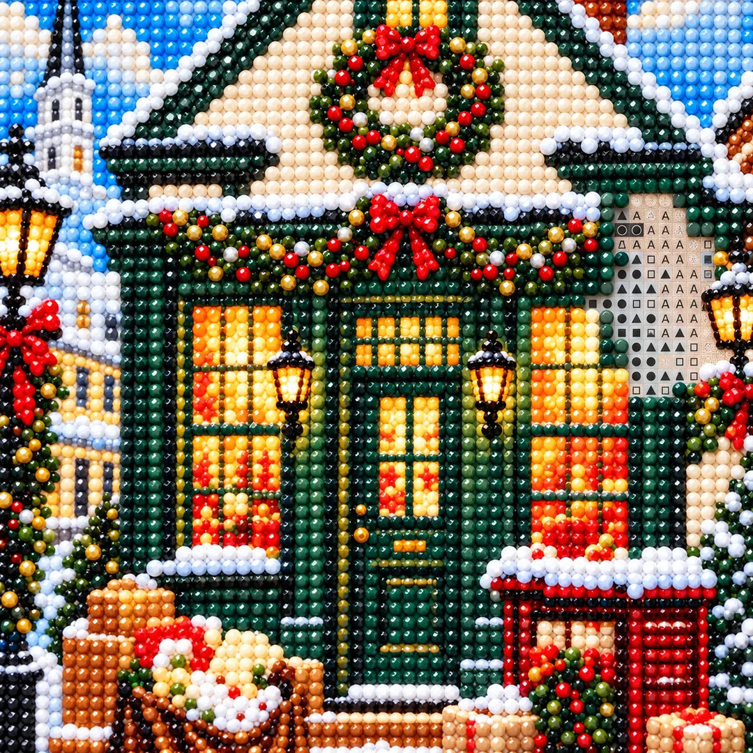 Close detail of uniform resin drills and symbols on Cozy Christmas Cottage