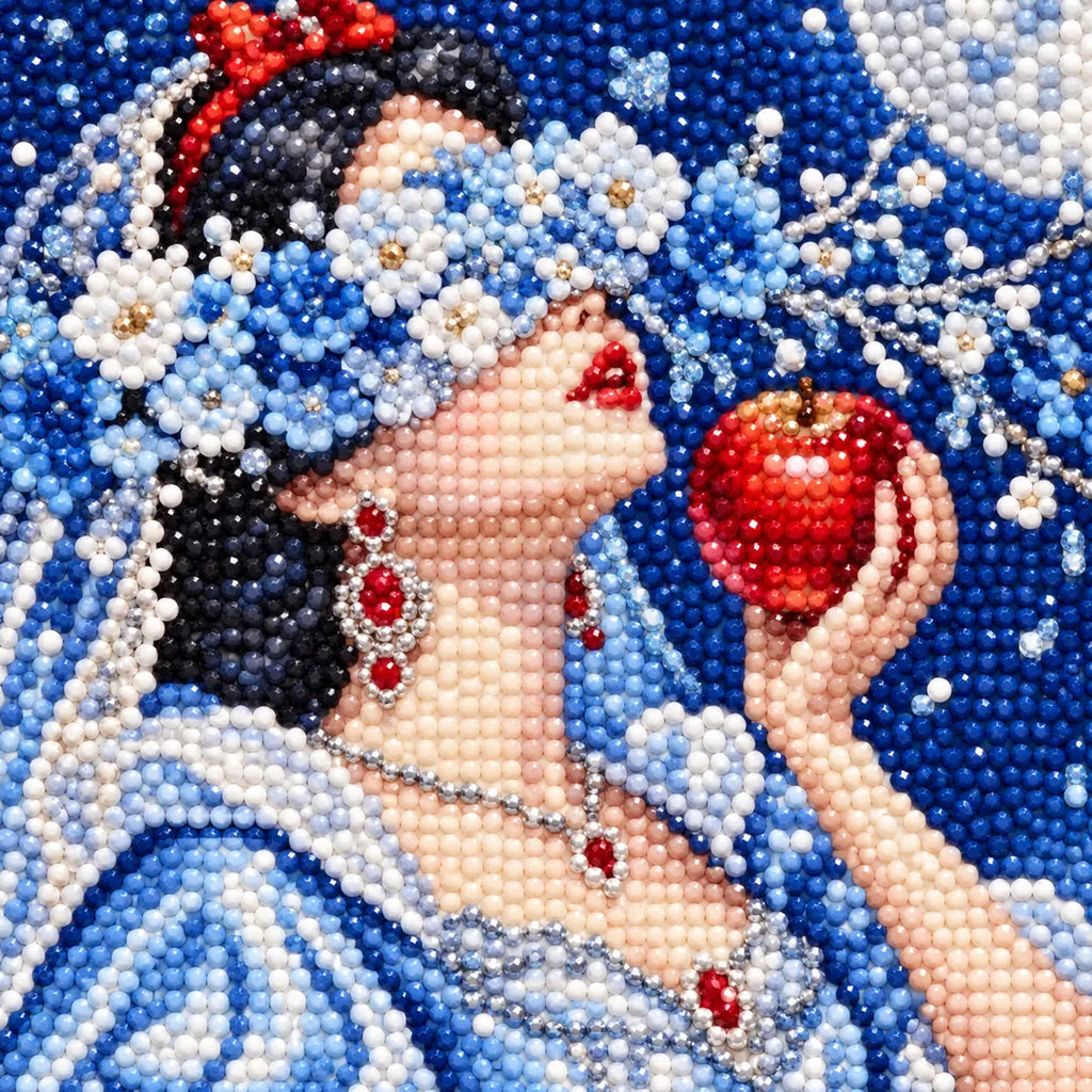 Close-up diamond drill detail of white blossoms and a pale blue bridal gown