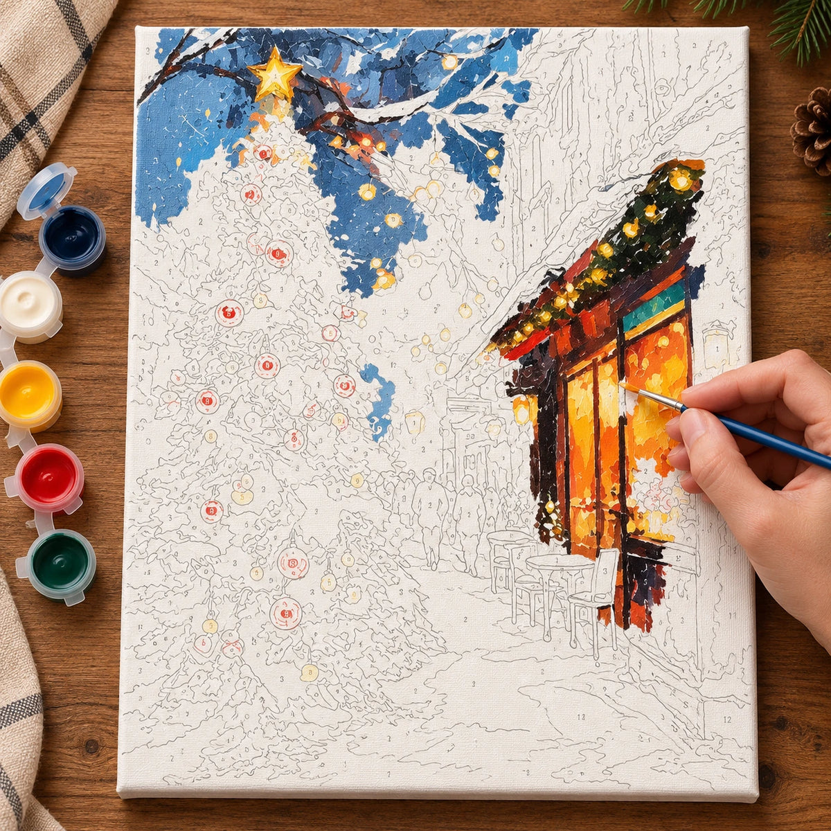 Complete Christmas Glow on a Snowy Street numbered canvas being painted with acrylic paints and brushes