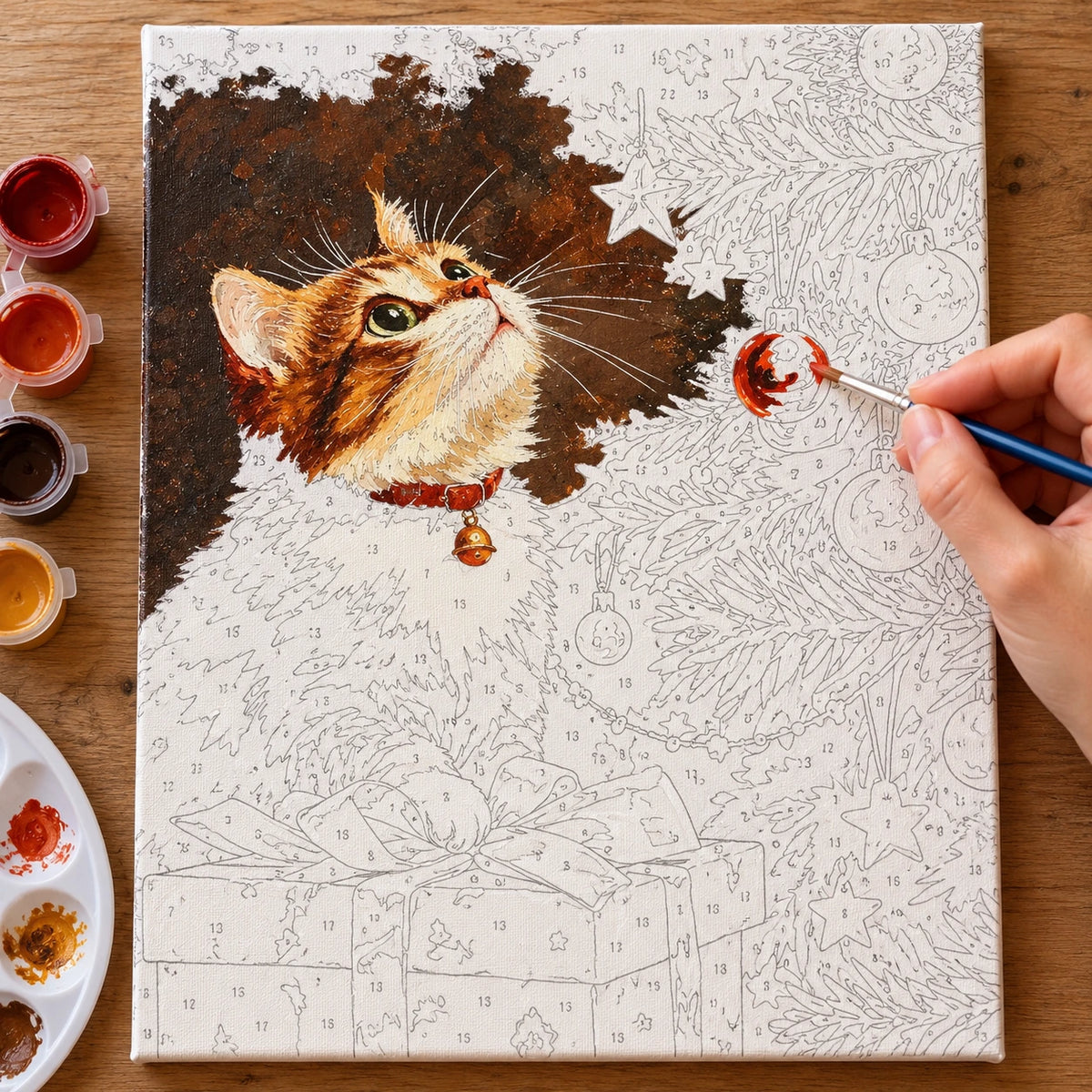 Complete Christmas Tree Cat with Gifts numbered canvas being painted with acrylic paints and brushes