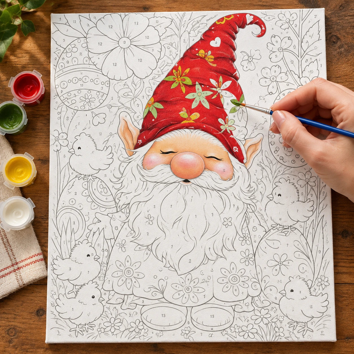 Complete Easter Gnome Among Spring Blooms numbered canvas being painted with acrylic paints and brushes