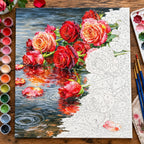 Floating Red Roses on Reflective Pond numbered canvas being painted with acrylic paints and brushes