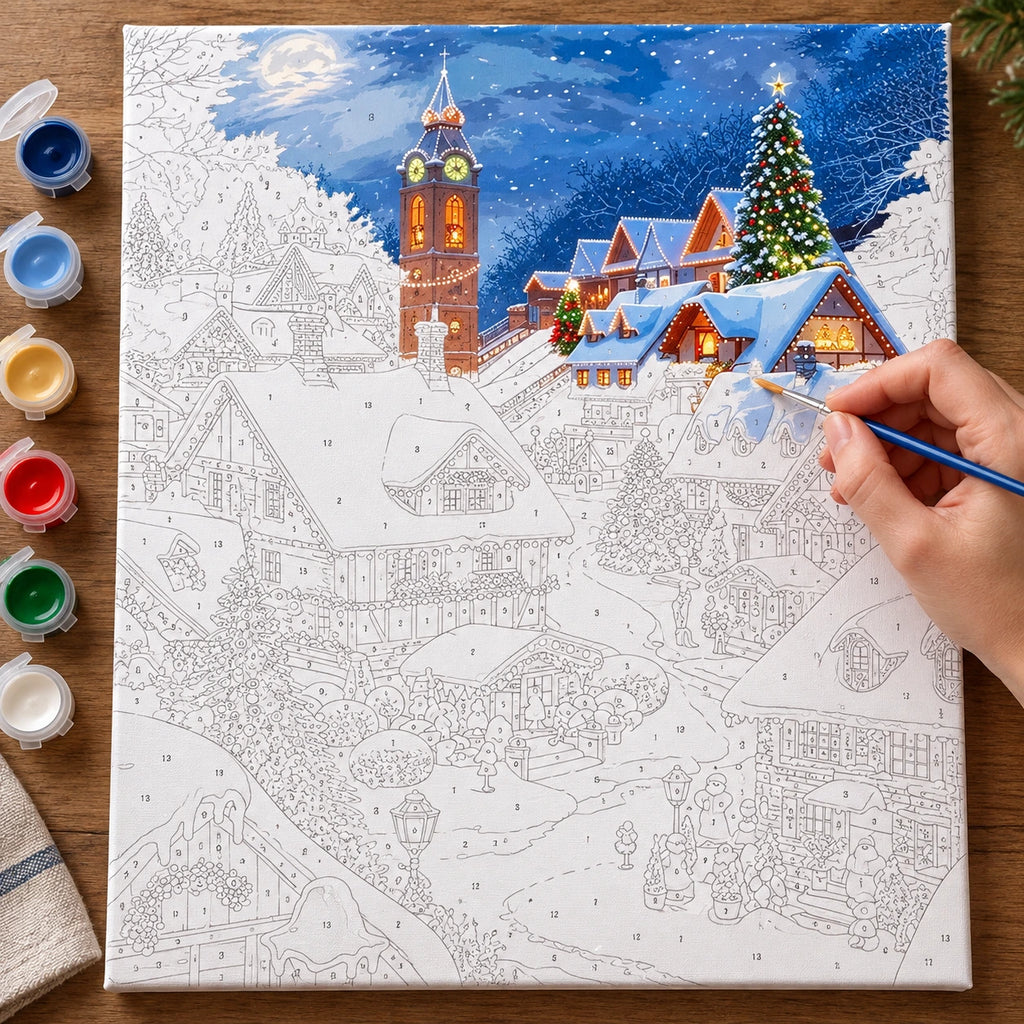 Complete Glow Over the Snowy Village numbered canvas being painted with acrylic paints and brushes