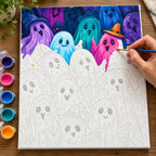 Complete Halloween Ghost Parade numbered canvas being painted with acrylic paints and brushes