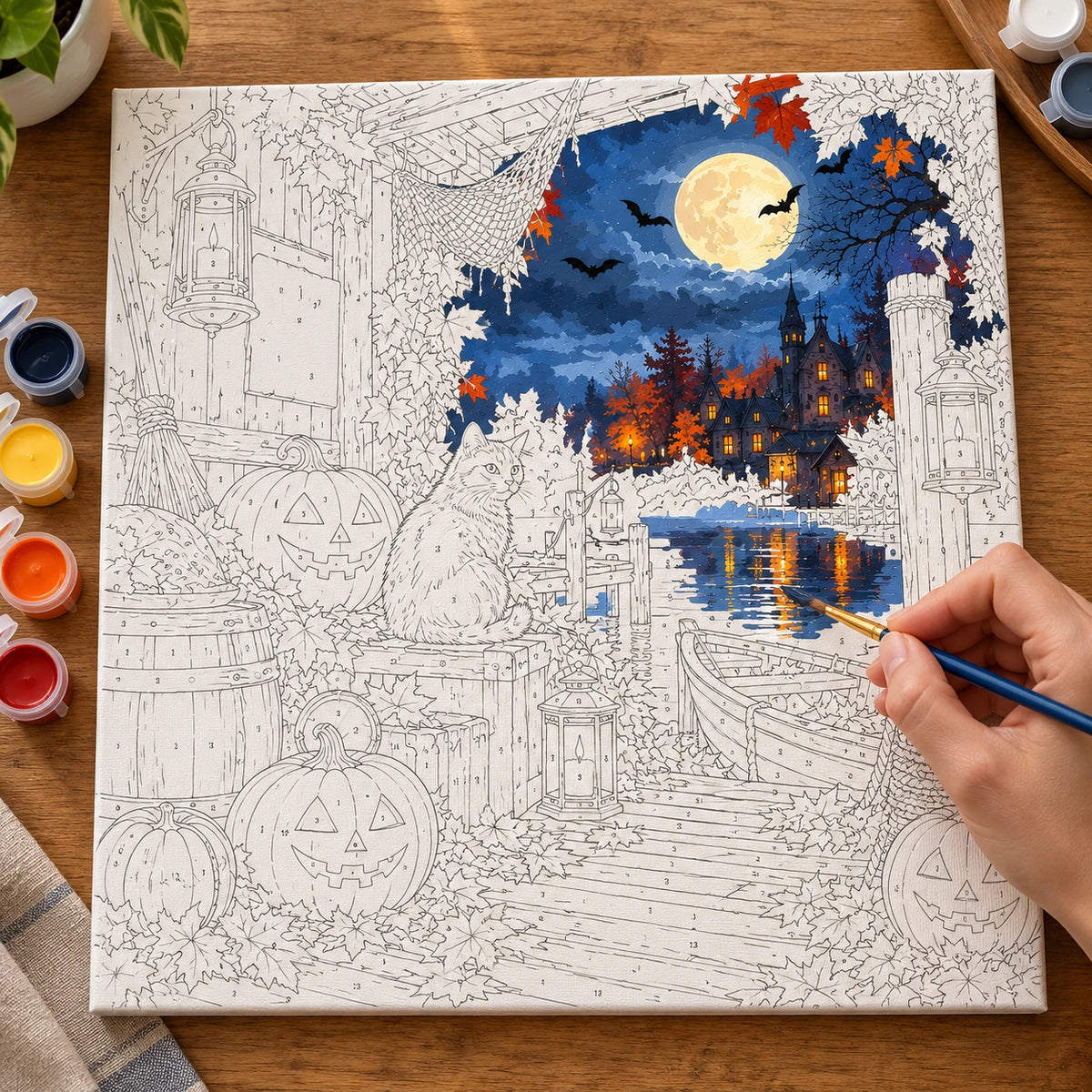 Complete Harvest Moon Harbor numbered canvas being painted with acrylic paints and brushes