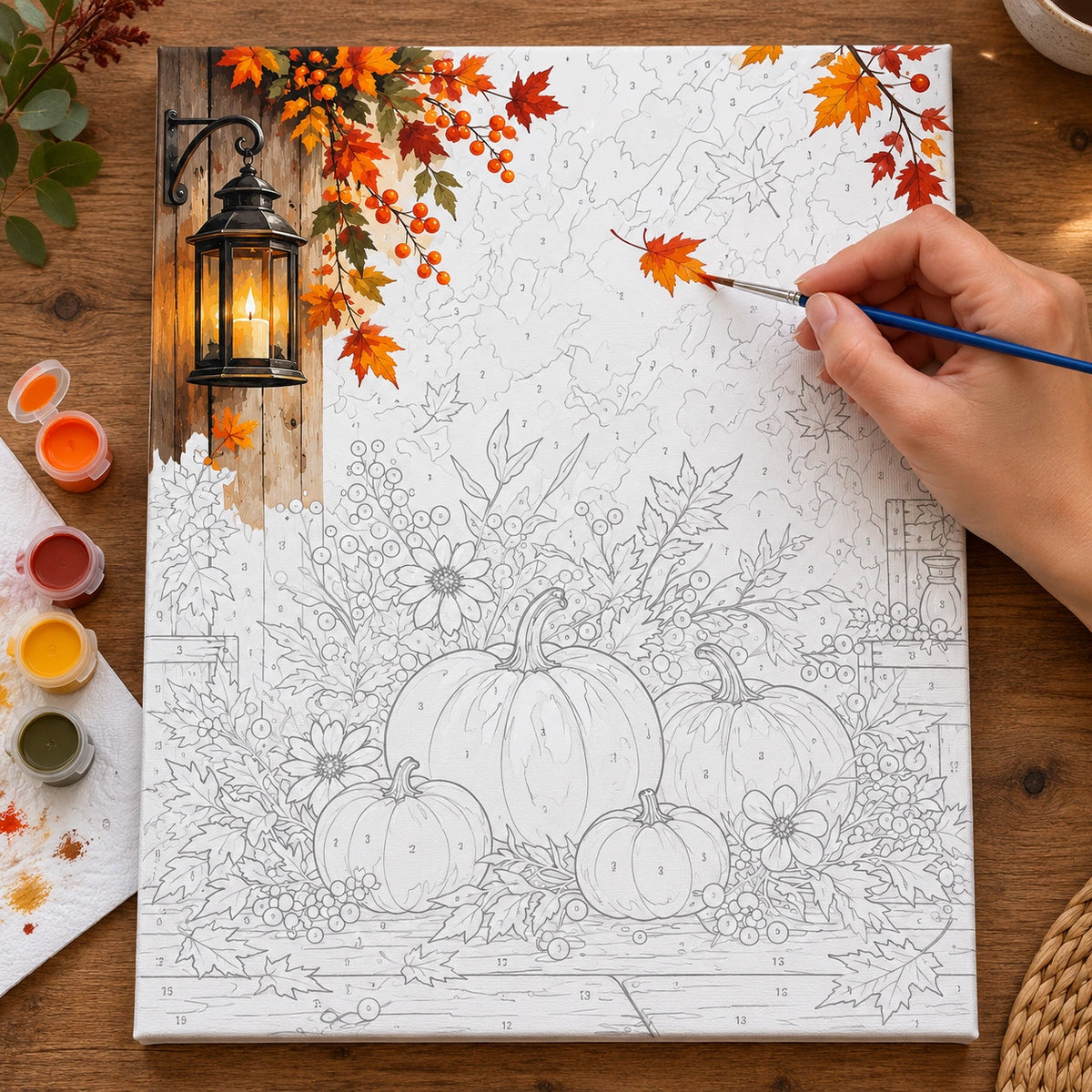 Complete Lantern Light and Autumn Bounty numbered canvas being painted with acrylic paints and brushes