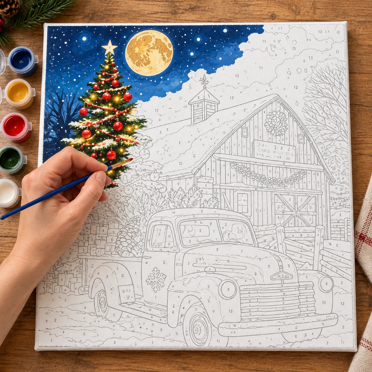 Complete Moonlit Christmas Delivery Red Truck numbered canvas being painted with acrylic paints and brushes