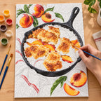 Painting process scene for the Peach Cobbler Iron Skillet kit, with the complete numbered canvas and painting tools.