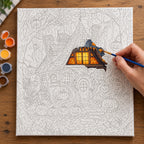 Complete Pumpkin Lantern Cottage numbered canvas being painted with acrylic paints and brushes