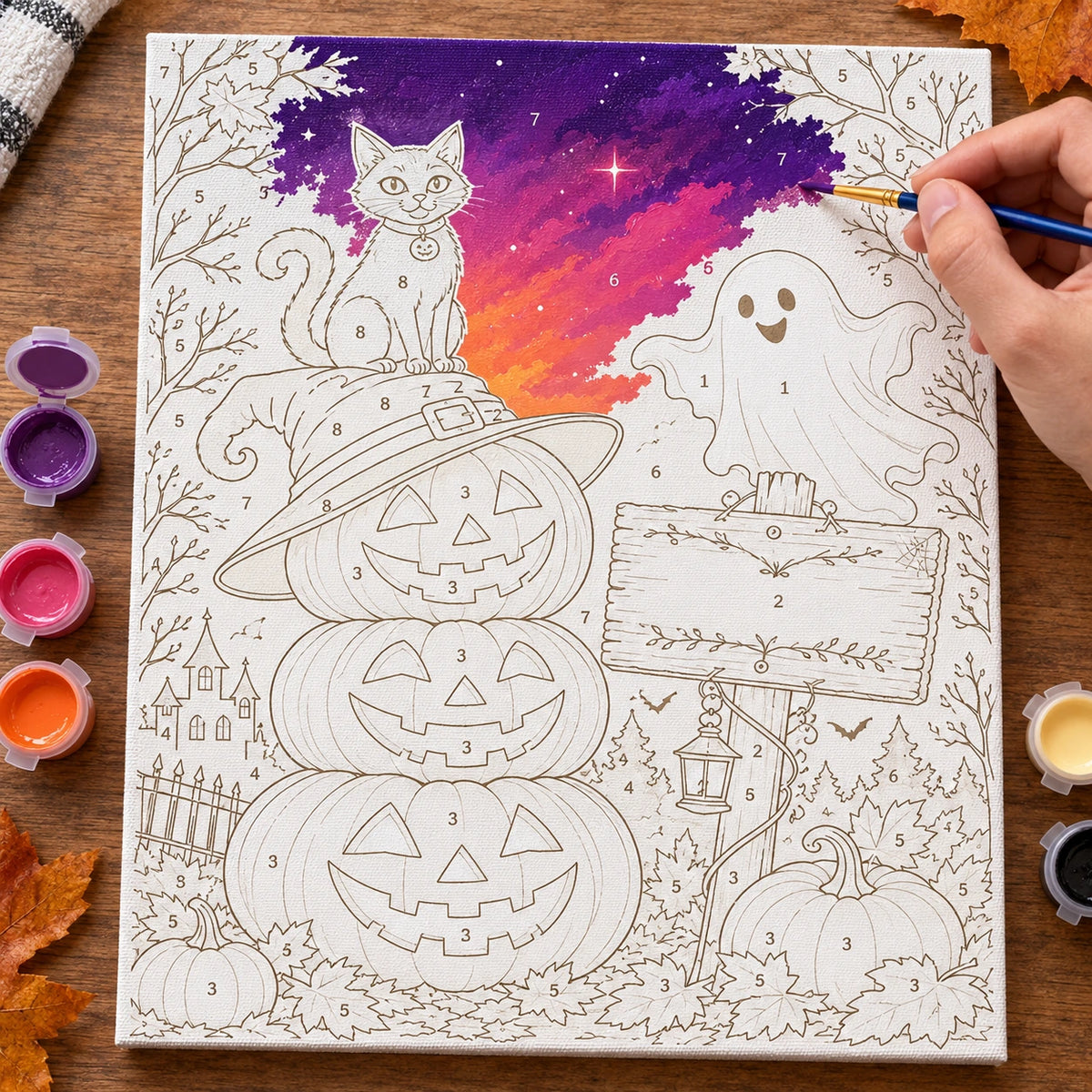 Complete Pumpkin Stack Gathering numbered canvas being painted with acrylic paints and brushes