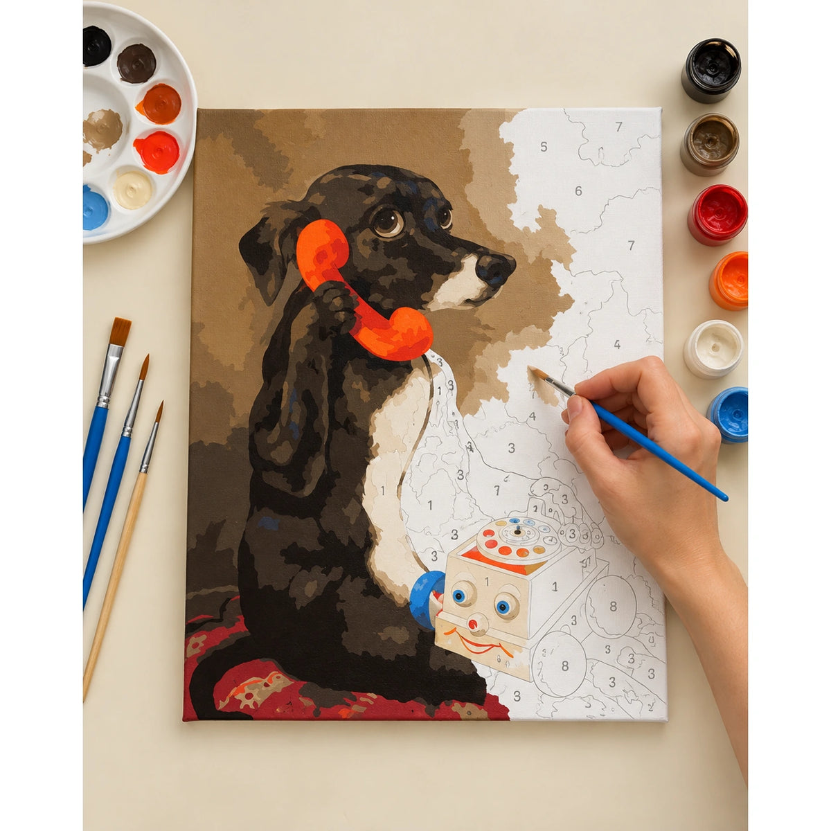 Complete Puppy with a Vintage Toy Telephone numbered canvas being painted with acrylic paints and brushes.