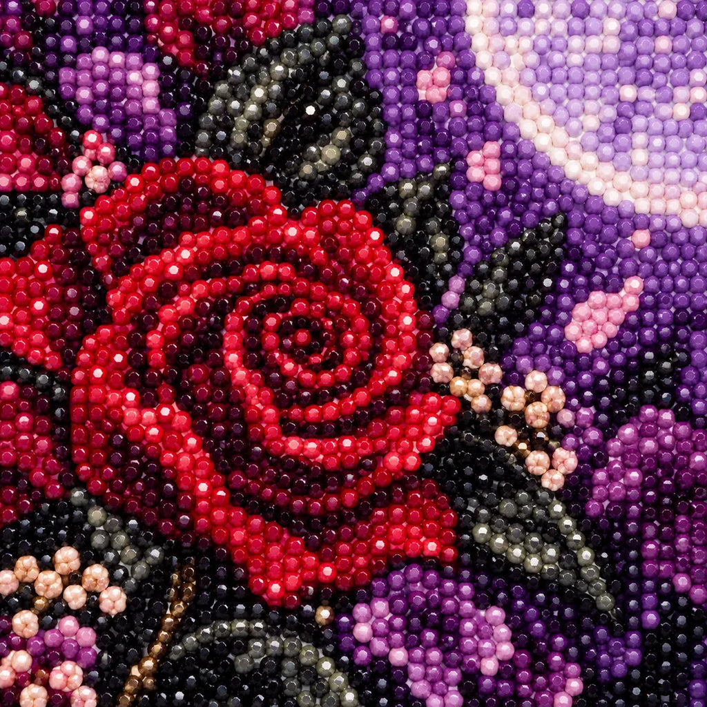 Close-up diamond drill detail of a rose-veiled bride holding a red apple