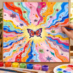 Complete Rainbow Butterfly Starburst numbered canvas being painted with acrylic paints and brushes