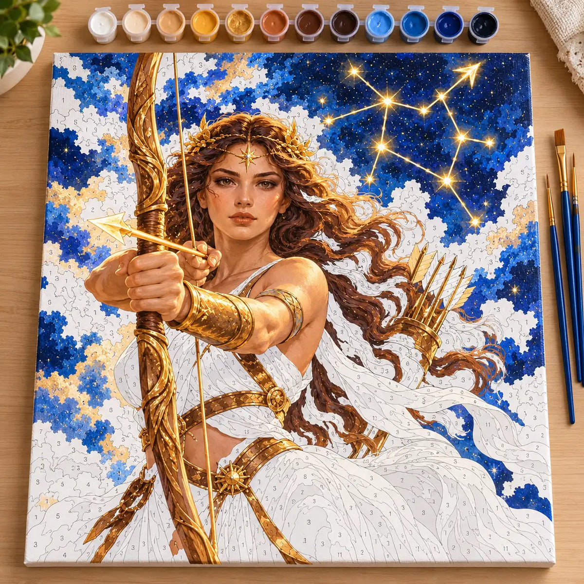 Painting process scene for the Sagittarius Woman Archer Constellation kit, with the complete numbered canvas and painting tools.