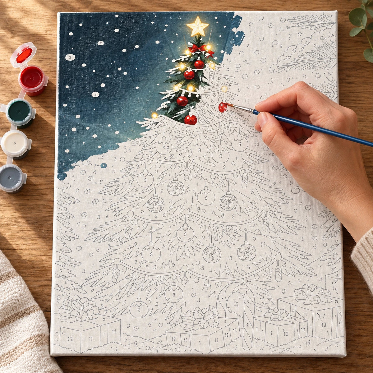 Complete Snowfall Beneath Christmas Lights numbered canvas being painted with acrylic paints and brushes