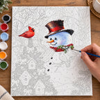 Complete Snowman Festive Bird Garden numbered canvas being painted with acrylic paints and brushes