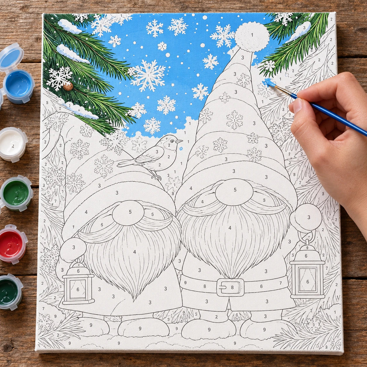 Complete Snowy Gnome Companions numbered canvas being painted with acrylic paints and brushes