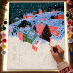 Complete Snowy Pink Alpine Village Christmas Tree numbered canvas being painted with acrylic paints and brushes