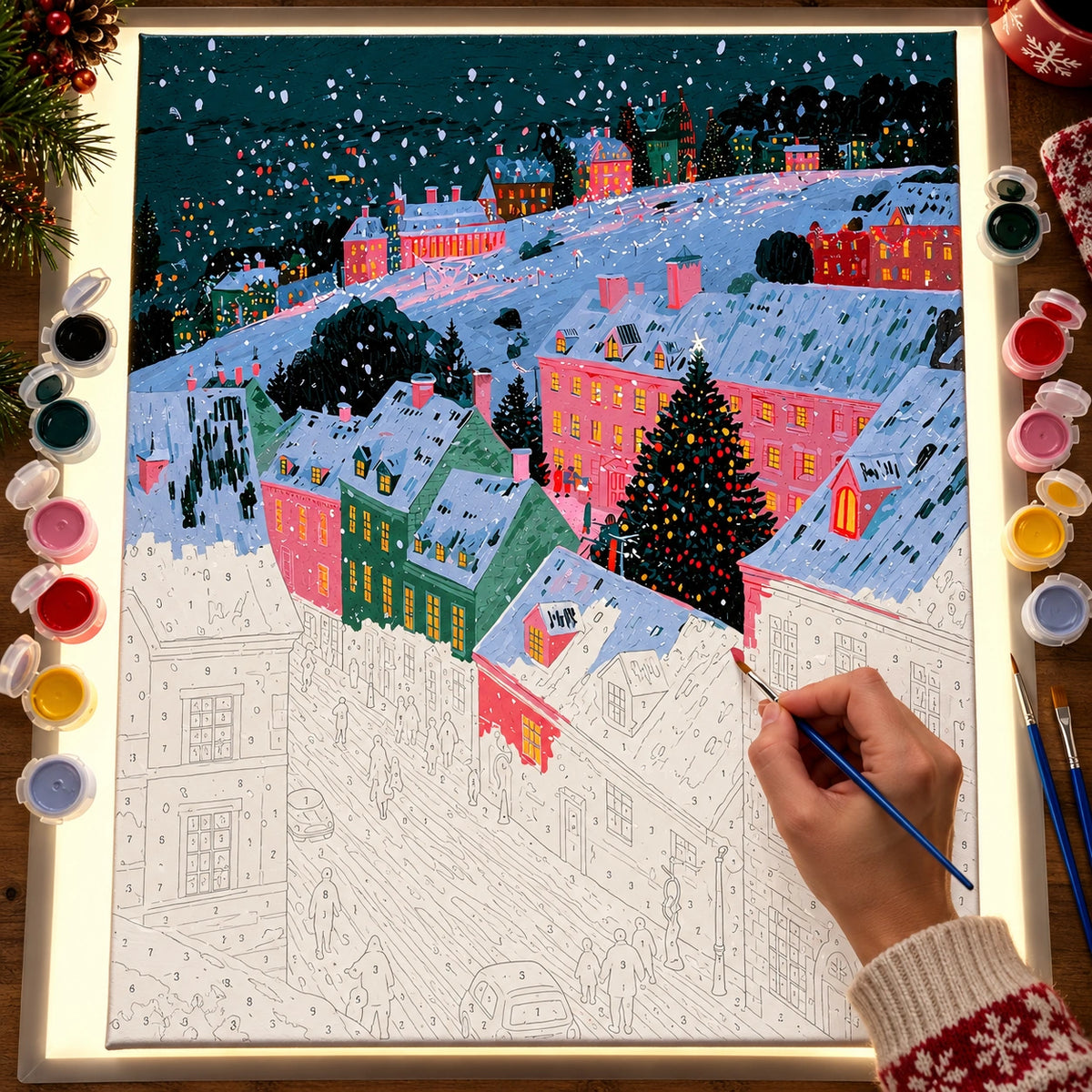 Complete Snowy Pink Alpine Village Christmas Tree numbered canvas being painted with acrylic paints and brushes