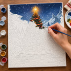 Complete Star Over the Snowy Pines numbered canvas being painted with acrylic paints and brushes