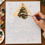 Complete Star Topped Christmas Glow Tree numbered canvas being painted with acrylic paints and brushes