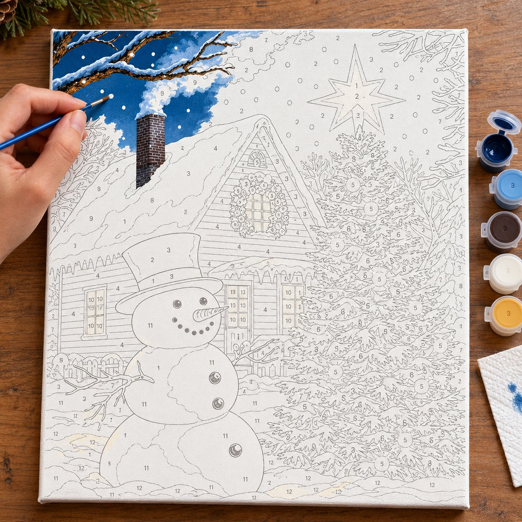 Complete Starlit Christmas Cabin Snowman numbered canvas being painted with acrylic paints and brushes