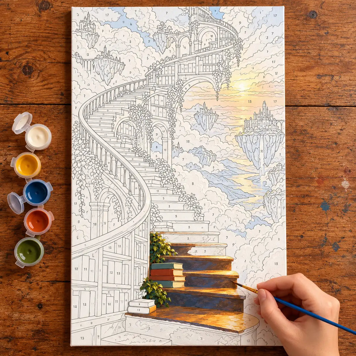 Painting process scene for the Surreal Library Floating Stairs kit, with the complete numbered canvas and painting tools.