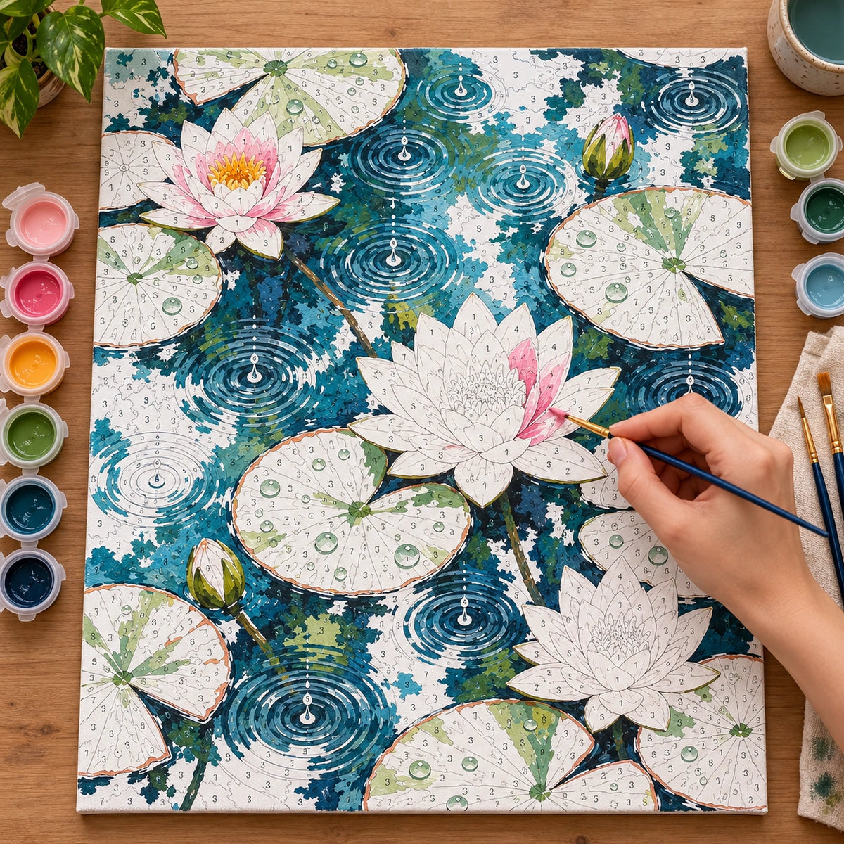 Complete Water Lilies Rain Rings numbered canvas being painted with acrylic paints and brushes