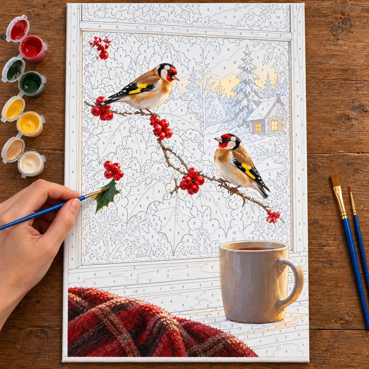 Complete Winter Birds Holly Window numbered canvas being painted with acrylic paints and brushes