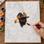 Complete Witch Halloween Companion Black Cat numbered canvas being painted with acrylic paints and brushes