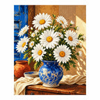 Completed diamond painting for Sunlit Daisies in Blue Vase Diamond Painting Kit on a white background