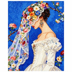White-background diamondized artwork of a profile bride beneath a floral veil