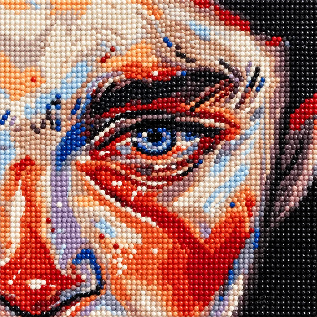 Close-up of colorful diamond drills around the blue eye in an abstract portrait.