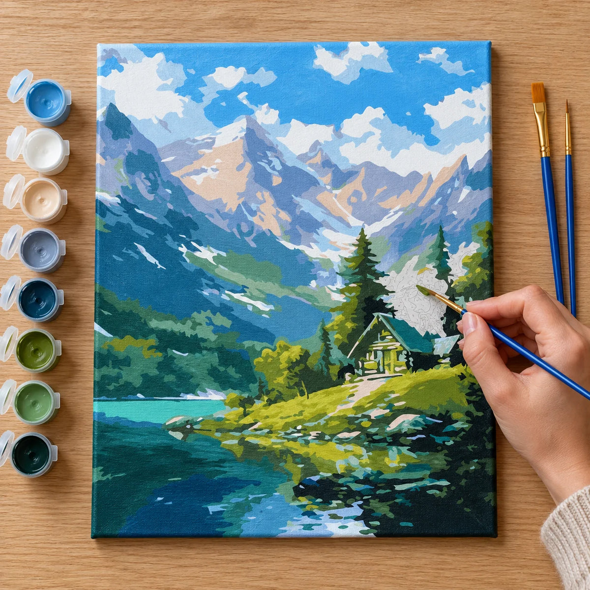 Complete Alpine Cabin by Mountain Lake numbered canvas being painted with acrylic paints and brushes