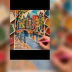 Diamond painting process showing Amsterdam canal houses being completed with a stylus