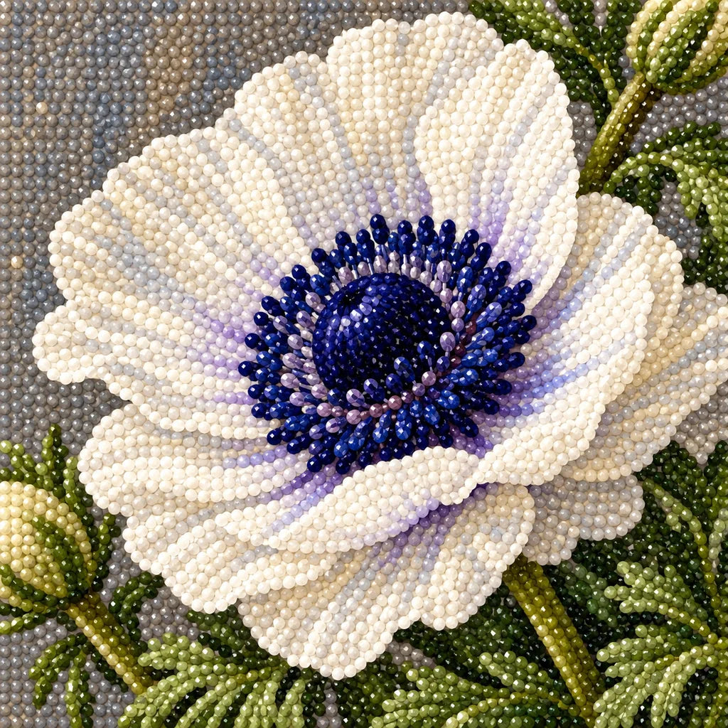 White anemones with deep navy centers and green leaves in a ceramic vase tied with a cobalt ribbon: close-up of the diamond drills