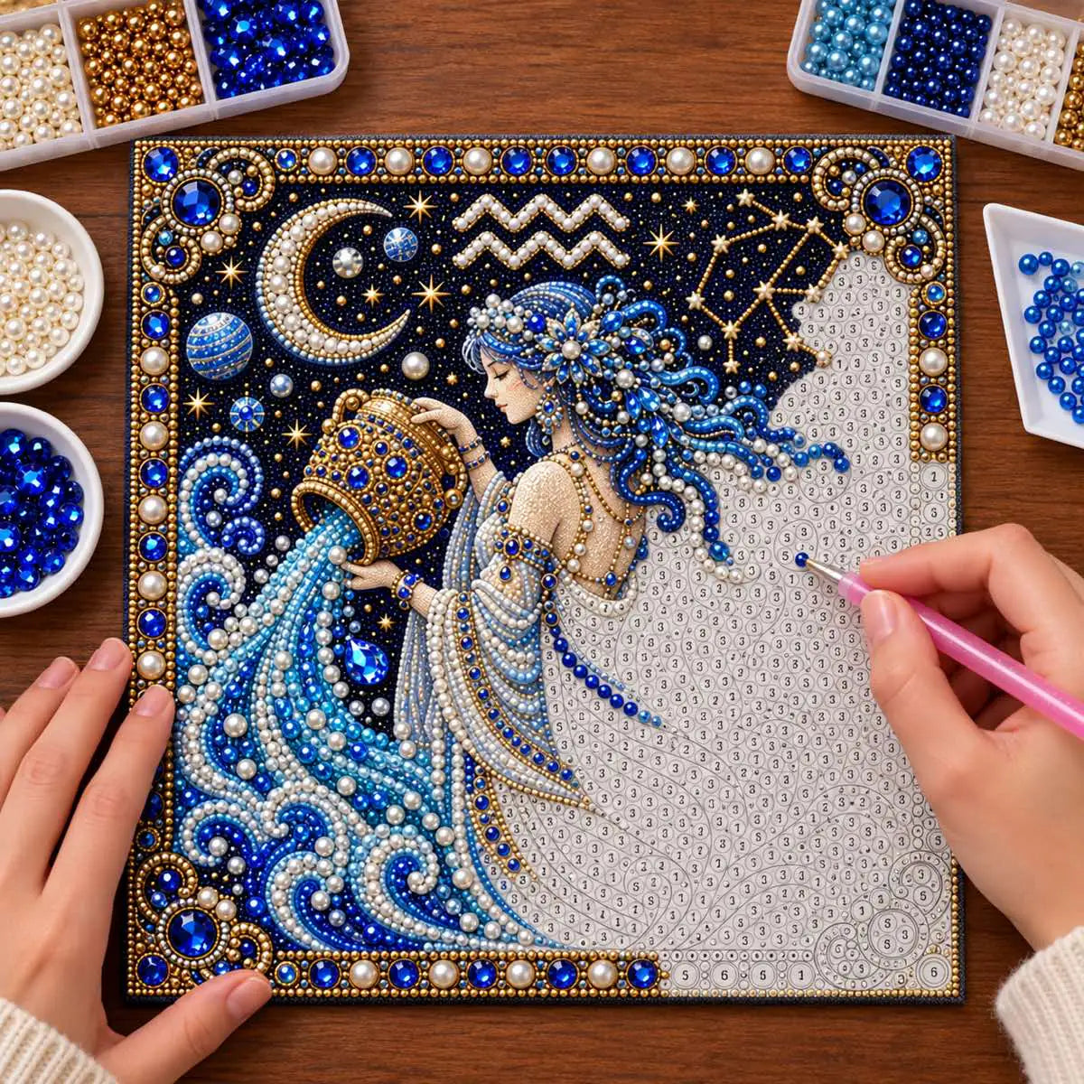 Pearl placement process on the aquarius printed canvas
