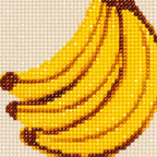 Close-up of diamond drill texture across a ripe yellow banana bunch with the words “The Bananas Are Ripe”.