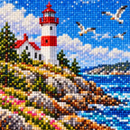 Close-up of diamond drills forming the lighthouse, boats, and flowers in the Atlantic harbor design
