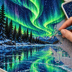 Hands placing diamond drills on the Aurora Spruce Forest design.