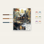 Complete Autumn Cabin by Waterfall numbered canvas being painted with acrylic paints and brushes