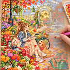 Diamond painting process showing a young woman sketching among autumn flowers beside a golden dog being completed with a stylus
